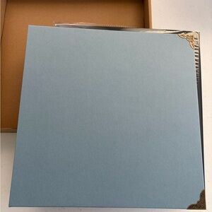 Elegant Blue Photo Album with Gold Accents